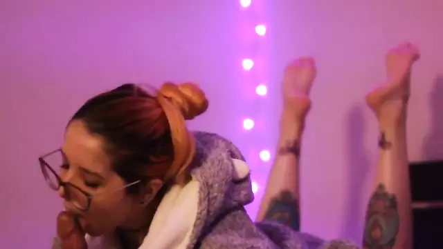 Dominican girl with glasses gently sucks a guy's dick